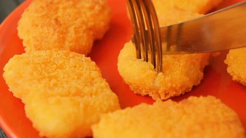 Fresh cooked chicken nuggets for lunch Stock Footage 70094693