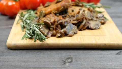 Fresh cooked pork chops meat with grilled mushrooms Stock Footage 83600848
