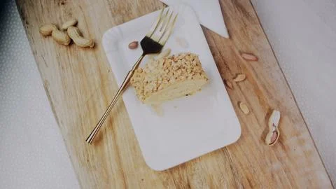 Fresh cooking process view: rolling the filled cake into shape Stock Photos