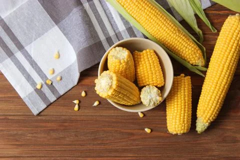 Fresh corn close-up on the table. Stock Photos