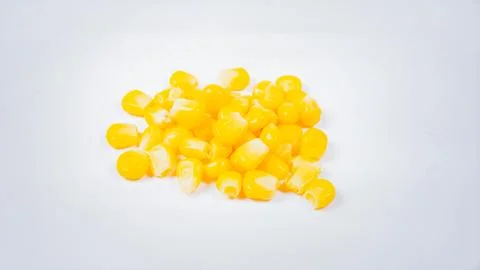 Fresh Corn Kernels Isolated on White Background, Yellow Grain Vegetable Use.. Stock Photos