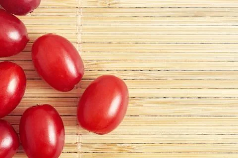 Fresh cornel berries Stock Photos
