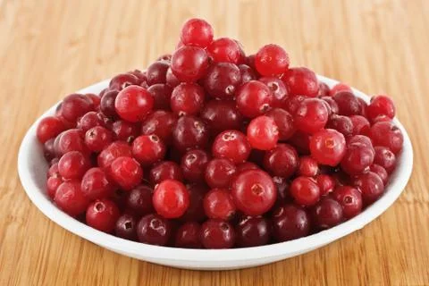 Fresh cranberries on a plate Stock Photos