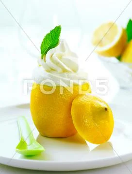 Fresh creamy icecream and lemon Stock Photos