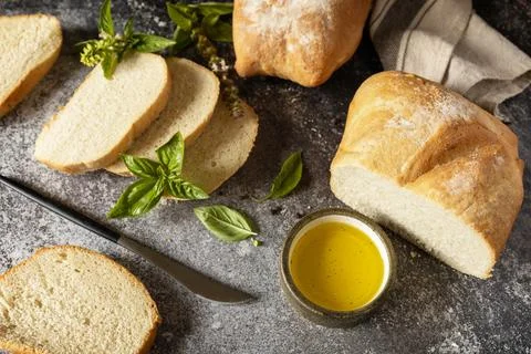 Fresh crispy Ciabatta bread. Sliced Italian ciabatta bread with extra virgi.. Stock-Fotos