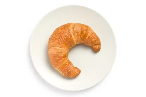 Fresh croissant on plate Stock Photos