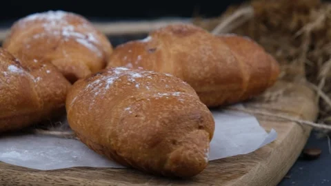 Fresh croissant rotating Video stock 243884805