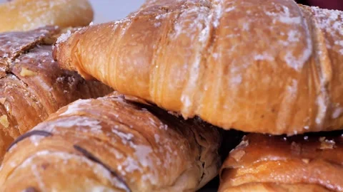 Fresh croissants close up macro view. French croissants rotate. Fresh and Stock Footage 227195380