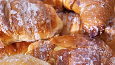 Fresh croissants close up macro view. French croissants rotate. Fresh and Stock Footage 227593778