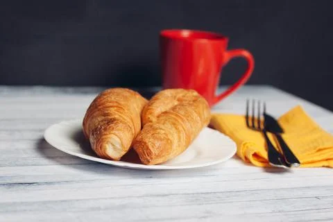 Fresh croissants serving table breakfast dessert coffee Stock Photos