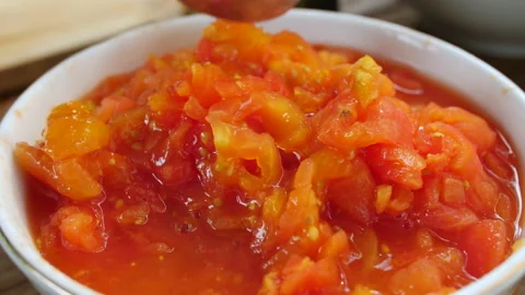 Fresh Crushed Tomatoes, 4K Stock Footage 148190629