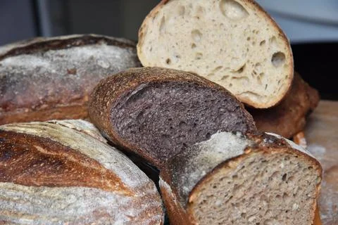 A fresh crusty loaf of homemade bread. Stock Photos