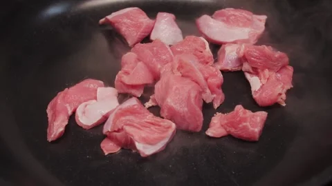 Fresh cubes of turkey fried pan. Diet healthy food concept. Stock Footage 313135378