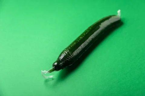 Fresh cucumber in disposable plastic package Stock Photos
