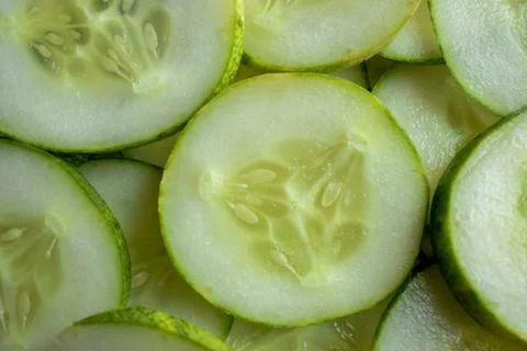 Fresh Cucumber Round Circle Slices As Whole background Texture Stock Photos