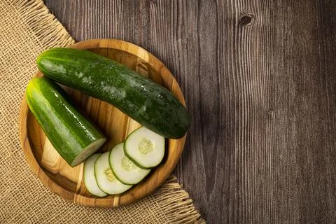 Fresh cucumber sliced ??on the table. Stock Photos
