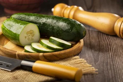 Fresh cucumber sliced ??on the table. Stock Photos