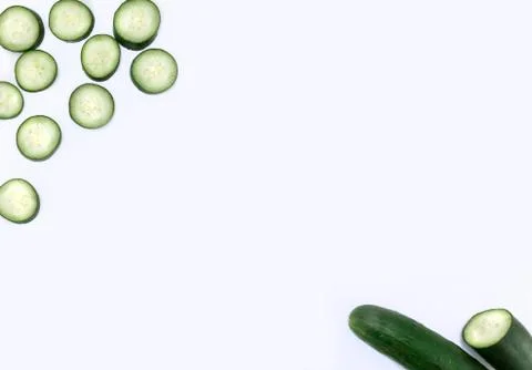 Fresh Cucumber Sliced on white background top view text area Stock Photos