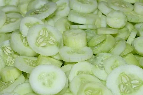 Fresh cucumber slices background. Stock Photos