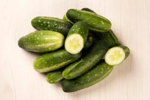 Fresh cucumber on the white background Stock Photos