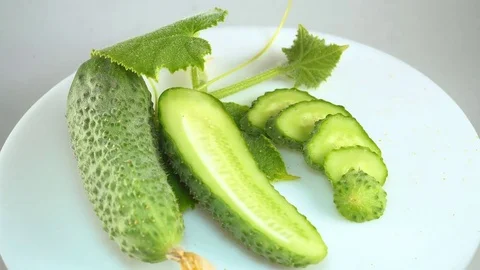 Fresh cucumber on a white plate. Stock Footage 77714745