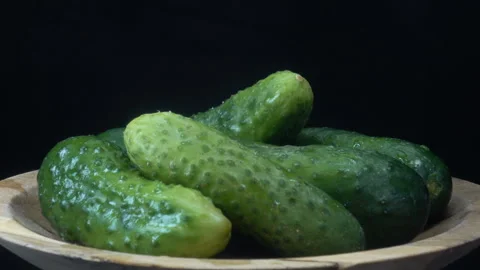 Fresh cucumbers on plate Stock Footage 138265815