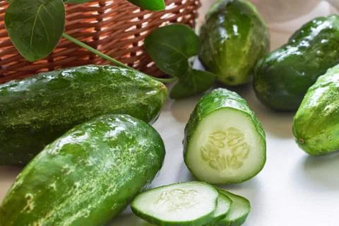 Fresh cucumbers on table Stock Photos