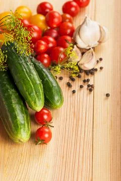 Fresh cucumbers, tomatoes of cherry and fennel branch Stock Photos