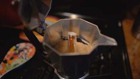 Fresh Cup of Coffee Being Brewed in a Moka Pot Stock Footage 102343257
