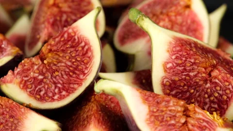 Fresh cut figs close up rotating Stock Footage 139767599