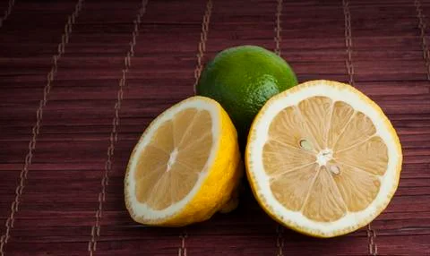 Fresh cut lemon and lime Stock Photos