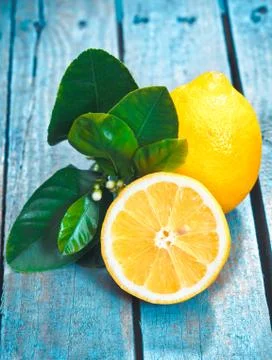 Fresh cut lemon on rustic boards Stock Photos
