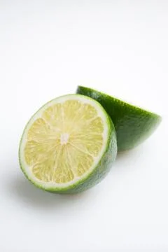 Fresh cut lime - isolated Fotos de archivo