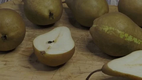 Fresh cut pears on a cutting board Stock Footage 205554887