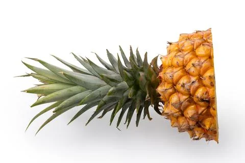 Fresh cut pineapple fruit isolated on white background with clipping path. Stock Photos