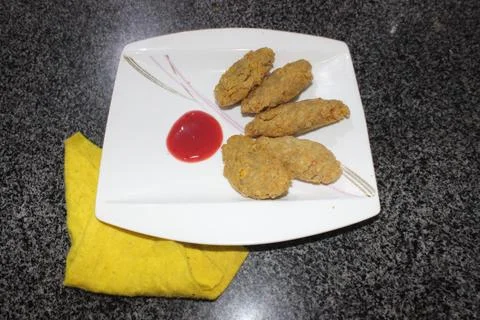 Fresh cutlets with sauce Stock Photos