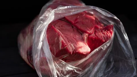 Fresh cuts of beef packaged in plastic for sale at a local market or butche.. Stock-Fotos