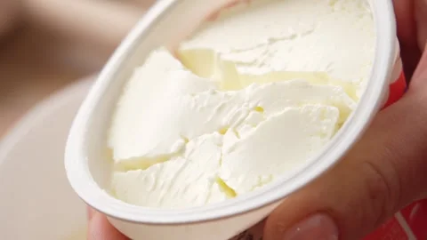 Fresh Dairy Cream Cheese in Container. Stock Footage 255745874