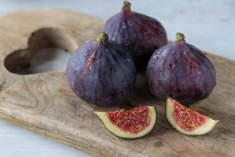 Fresh dark figs Stock Photos