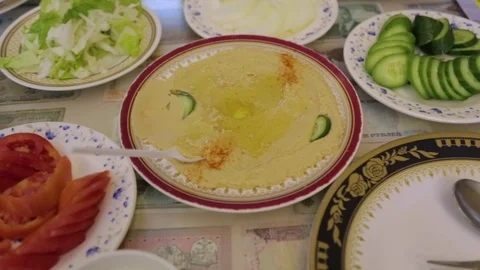 Fresh dates and vegetables served on the restaurant table Stock Footage 72981454