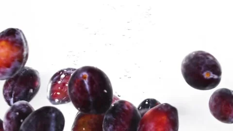 Fresh Dates Falling into Crystal Clear Water Slow Motion Splash Video stock 304185928