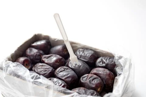 Fresh dates in a pack. Packed box with Iranian dates Stock Photos