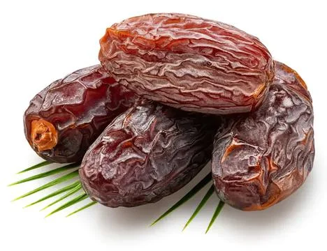 Fresh dates with pits and dried texture on white background Stock Photos