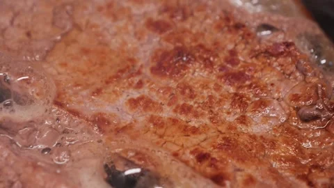 Fresh delicious beef chop frying in a frying pan. Concept of healthy diets. Stock Footage 314333776