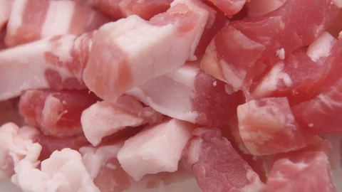 Fresh diced pork ham in cubes, closeup Stock Footage 127827583
