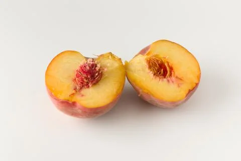 Fresh dissected peach Stock Photos