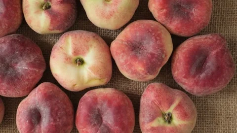 Fresh donut peaches on a rustic background Stock Footage 339367026