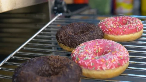 Fresh doughnuts on a baking sheet Stockbeeldmateriaal 84817316