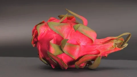 Fresh dragon fruit on gray background. Stock Footage 121706797