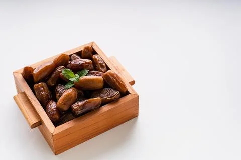 Fresh dried dates fruit on white isolated background. Stock Photos